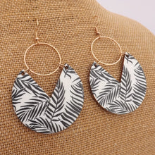 Load image into Gallery viewer, Black Leaves on Cream Wood & Gold Tone Drop Earrings