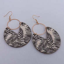 Load image into Gallery viewer, Black Leaves on Cream Wood & Gold Tone Drop Earrings