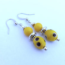 Load image into Gallery viewer, Yellow, Black & White Dotted Handmade Bead Earrings