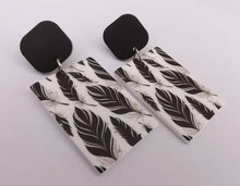 Load image into Gallery viewer, Black & White Feather Acrylic Earrings