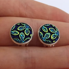 Load image into Gallery viewer, Blue Glittery Flowers on Black Handmade Clip on Earrings