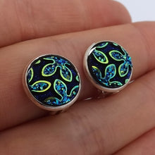 Load image into Gallery viewer, Blue Glittery Flowers on Black Handmade Clip on Earrings