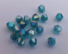 Load image into Gallery viewer, 40pcs Bluer Teal AB Lustre Glass Bicones 4mm Beads - btabd