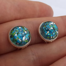 Load image into Gallery viewer, Blue & Green Glitter under Resin Dome Handmade Clip on Earrings