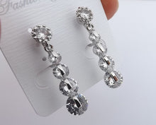 Load image into Gallery viewer, Clear Faux Diamond & Silver Tone Drop Earrings on Clip On Settings