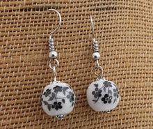 Load image into Gallery viewer, Small Black Flowers on White, Ceramic Look Bead Earrings