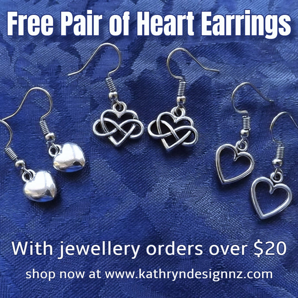 Free pair of Silver Tone Heart Earrings