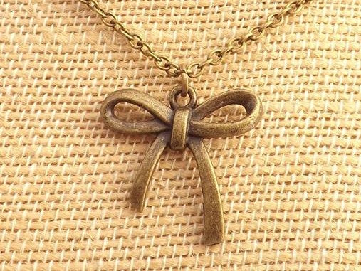 Ribbon Bronze Tone Pendant Necklace