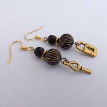 Load image into Gallery viewer, Black &amp; Gold Padlock &amp; Key Handmade Bead Earrings
