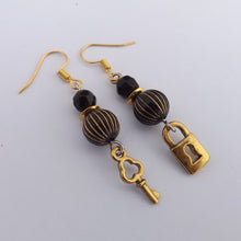 Load image into Gallery viewer, Black &amp; Gold Padlock &amp; Key Handmade Bead Earrings
