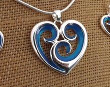 Load image into Gallery viewer, Blue &amp; Silver Tone Spiraled Heart Pendant Necklace
