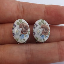 Load image into Gallery viewer, Floral Painted Ceramic Oval Clip on Earrings
