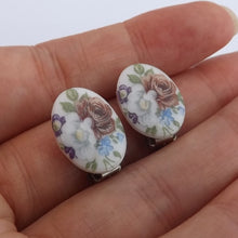 Load image into Gallery viewer, Floral Painted Ceramic Oval Clip on Earrings
