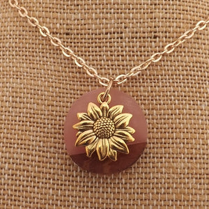 Gold Tone Sunflower on Resin & Wood Circle Pendant Necklace