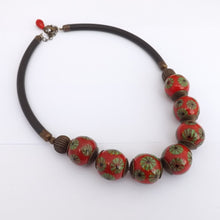 Load image into Gallery viewer, Green Flowers on Red Ceramic Bead Necklace
