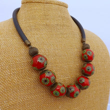 Load image into Gallery viewer, Green Flowers on Red Ceramic Bead Necklace
