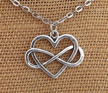 Load image into Gallery viewer, Silver Tone Heart &amp; Infinity Twist Necklace Pendant
