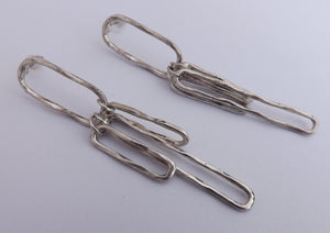 Long Beaten Silver Tone Oval Link Earrings