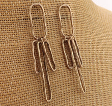 Load image into Gallery viewer, Long Beaten Silver Tone Oval Link Earrings
