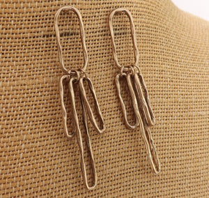 Long Beaten Silver Tone Oval Link Earrings