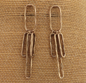 Long Beaten Silver Tone Oval Link Earrings