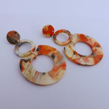 Load image into Gallery viewer, Marbled Orange, Black &amp; Cream Acrylic Earrings
