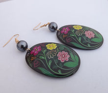 Load image into Gallery viewer, Pink, Yellow &amp; Green Flowers on Black Large Oval Acrylic &amp; Bead Drop Earrings
