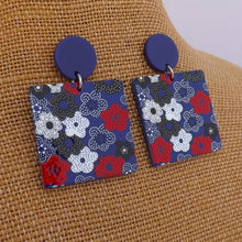 Load image into Gallery viewer, Red, White &amp; Dark Blue Floral Acrylic Drop Earrings
