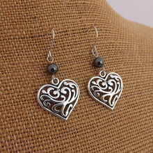 Load image into Gallery viewer, Silver Tone Filigree Heart &amp; Hematite Bead Drop Earrings
