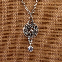 Load image into Gallery viewer, Silver Tone Floral Pendant with Purple Rhinestone Drop
