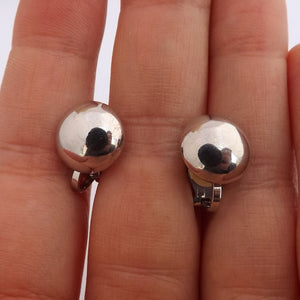 Silver Tone Round Clip on Earrings