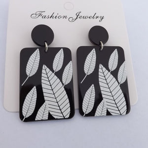 White Leaves on Black Acrylic Rectangle Earrings