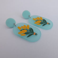 Load image into Gallery viewer, Yellow Daffodils on Blue Acrylic Drop Earrings
