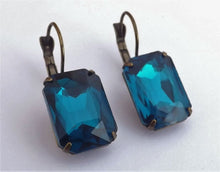 Load image into Gallery viewer, Blue Faceted Bronze Tone Rectangle Lever Back Earrings
