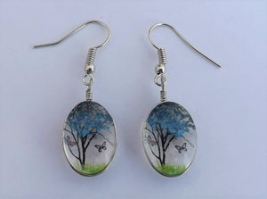 Clear Glass Oval Drop Earrings with Light Blue Tree & Butterflies Inside