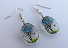 Load image into Gallery viewer, Clear Glass Oval Drop Earrings with Light Blue Tree &amp; Butterflies Inside
