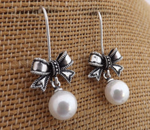 Load image into Gallery viewer, Crushed Sea Shell Pearl &amp; Silver Tone Bow, Drop Earrings
