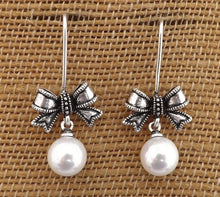 Load image into Gallery viewer, Crushed Sea Shell Pearl &amp; Silver Tone Bow, Drop Earrings
