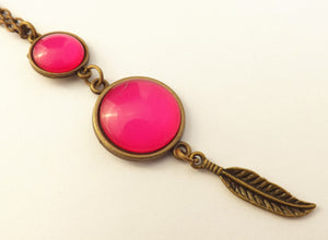 Hot Pink Double Dome Pendant with Bronze Tone Leaf