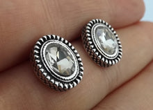 Load image into Gallery viewer, Faceted Silver Tone Oval Stud Earrings
