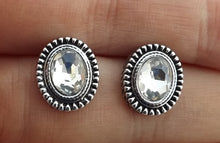 Load image into Gallery viewer, Faceted Silver Tone Oval Stud Earrings
