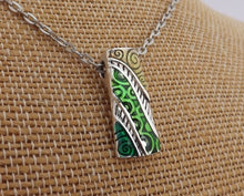 Load image into Gallery viewer, Green, Yellow &amp; Silver Toned Koru Enamel Look Pendant Necklace
