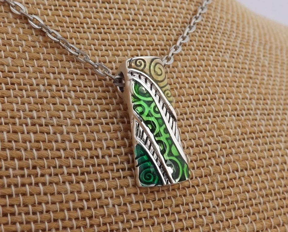Green, Yellow & Silver Toned Koru Enamel Look Pendant Necklace