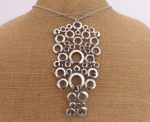 Load image into Gallery viewer, Large Silver Tone Rings Pendant Necklace
