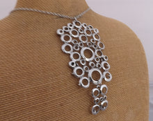 Load image into Gallery viewer, Large Silver Tone Rings Pendant Necklace

