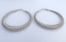 Load image into Gallery viewer, Large Spring Style Silver Tone Hoop Earrings
