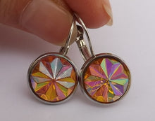 Load image into Gallery viewer, Orange Faceted Star Earrings on Lever Back Hooks
