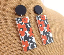 Load image into Gallery viewer, Orange, Black &amp; White Floral Acrylic Earrings
