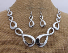 Load image into Gallery viewer, Silver Tone Infinity Twist Collar Necklace &amp; Earrings Set
