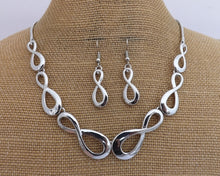 Load image into Gallery viewer, Silver Tone Infinity Twist Collar Necklace &amp; Earrings Set
